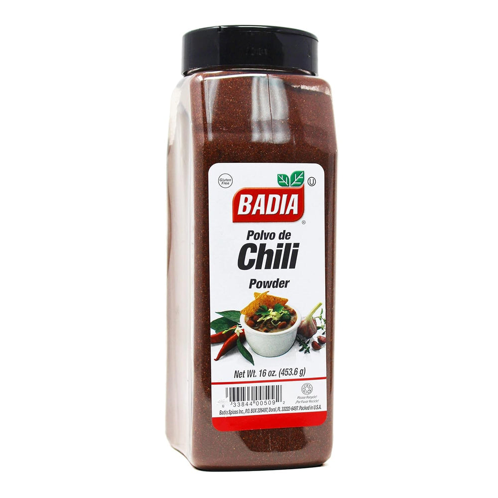 Badia Chili Powder bottle pouring adds smoky warmth to tacos.