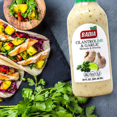 Badia Cilantro Lime Garlic Marinade on chicken skewers during grilling