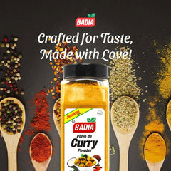Badia curry powder jar simmering in a cooking pot for curry.
