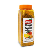 Badia Mango Pepper Seasoning bottle pouring onto grilled chicken.