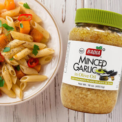 Badia minced garlic in olive oil heats in a pan for vibrant stir-fries.