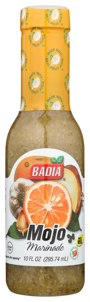 Badia Mojo Marinade bottle pour showing versatile grilling use