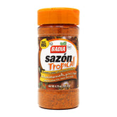 Badia Sazón Tropical bottle pouring to add golden color and aroma to meats