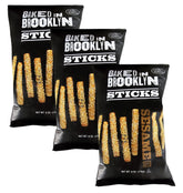 Baked in Brooklyn sesame sticks close-up; crispy snack for dipping.