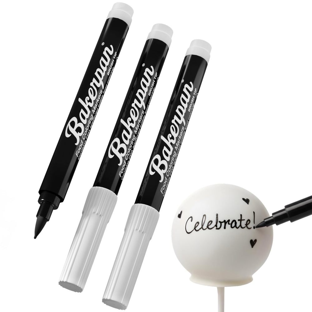 Bakerpan edible markers with a brush-tip in black for precise cake pop decoration.