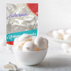 Whisking Bakerpan meringue powder into frosting to stabilize piping.