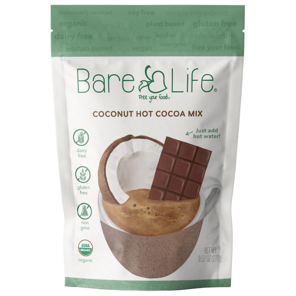 Bare Life coconut hot cocoa mix in a steaming mug for a cozy evening
