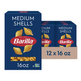 Barilla Medium Shells pasta box 12-pack on shelf, ideal for family dinners