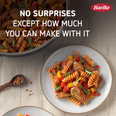 Served Barilla Red Lentil Rotini plated with tomato sauce on a plate.