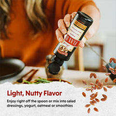 Barlean's flaxseed oil glass bottle emphasizes vegan, gluten-free omega-3 option.