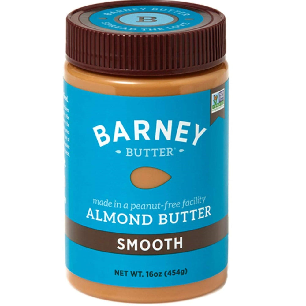 Barney Butter Smooth Almond Butter jar on toast, ultra-smooth and easy to spread.