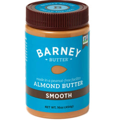 Barney Butter Smooth Almond Butter jar on toast, ultra-smooth and easy to spread.