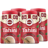 Baron's Tahini jar pouring, showcasing smooth consistency for easy blending.