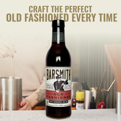 Barsmith Old Fashioned Mix being poured into a glass for a smooth, balanced whiskey drink