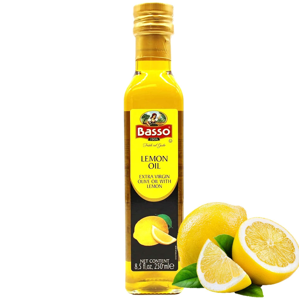 BASSO 1904 Lemon Oil bottle being poured, ideal for finishing dishes with bright citrus.
