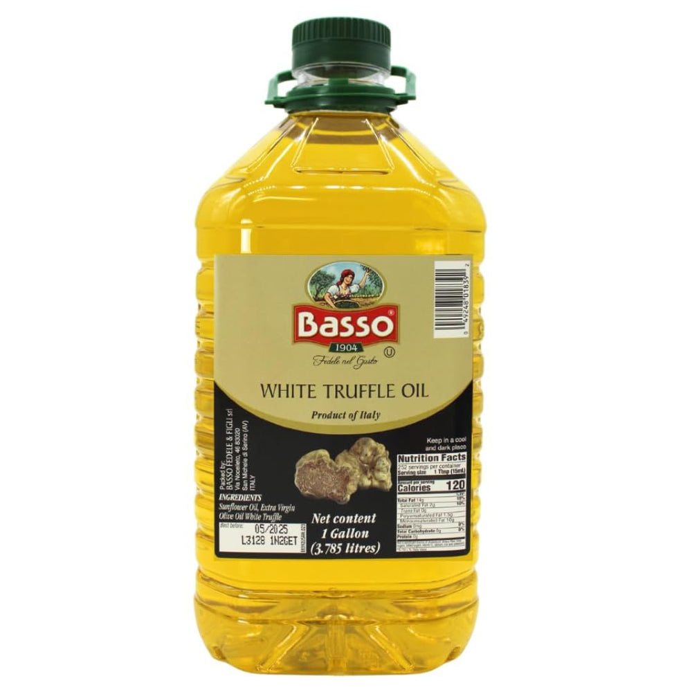 BASSO 1904 white truffle oil bottle pouring for finishing dishes.