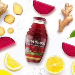Beetology cold-pressed beet juice pour reveals bright layers emphasizing flavor and nutrient retention