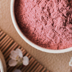 Beleon Tart Cherry Powder in a glass smoothie, vibrant color and tangy flavor