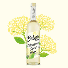 Belvoir Elderflower Syrup pour glass ready for refreshing drinks.