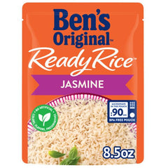 Serving fluffy Jasmine Rice from a BEN'S ORIGINAL microwave pouch