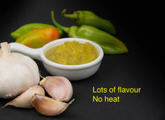 Berties Trinidad Pimento Sauce marinating chicken demonstrates heat-free seasoning options