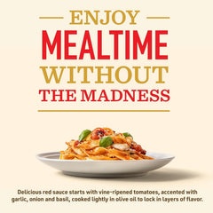 Pouring Bertolli tomato basil sauce over noodles for quick weeknight dinner