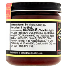 Better Than Bouillon Adobo Base being spooned for precise seasoning.