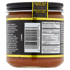 Better Than Bouillon Ham Base jar being poured for quick flavor boost in recipes.