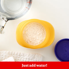 Betty Crocker Bisquick Shake 'n Pour batter on a hot griddle for breakfast.