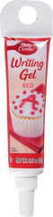 Betty Crocker Decorating Gel Red close-up with piping tip for fine lettering.