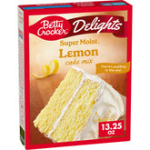 Betty Crocker Delights lemon cake mix box on a kitchen counter for quick dessert prep