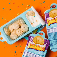 Dunkaroos dunk-action image showing cookies and frosting ready for dipping fun.