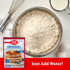 Betty Crocker pancake mix 37 oz package on pantry shelf for easy access.