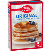 Betty Crocker pancake mix pour shows quick, reliable breakfast prep with just water.