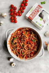Big Green Organic Food buckwheat rotini plated with sauce, highlighting a clean ingredient profile.