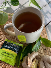 Bigelow Green Tea with Ginger Probiotics steeping cup ready for a soothing brew.