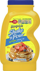 Shaking Bisquick Shake 'n Pour for smooth pancake batter