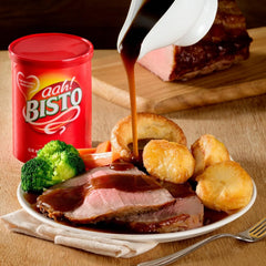 Creamy gravy poured over mashed potatoes with Bisto Granules.