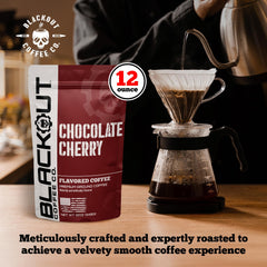 Brewed cup of Blackout Coffee Chocolate Cherry with inviting aroma.