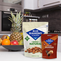 Blue Diamond almonds dark chocolate dipped ingredients close-up with California almonds