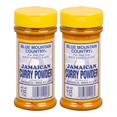 Blue Mountain Country Jamaican Curry Powder bottle pour for quick flavorful meals.