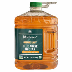 BLUE GREEN ORGANICS LIGHT agave syrup bottle pouring into coffee for smooth, natural sweetness.