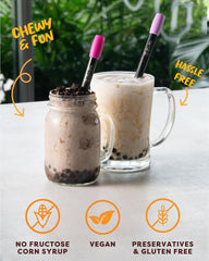 Boba Fide brown sugar boba close-up emphasizes rich flavor soaked pearls.