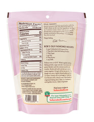 Pouring Bob's Red Mill Baking Powder into batter for even rise.