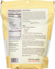 Stone-ground texture close-up of Bob's Red Mill Organic White Rice Flour, ideal for baking.