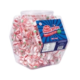 Bob's Sweet Stripes peppermint candies in a reusable tub at a party table