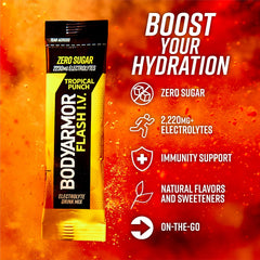 BODYARMOR Flash I.V. Tropical Punch pack with a glass ready to mix.