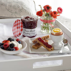Bonne Maman Strawberry Preserves on waffles, a cozy breakfast moment.