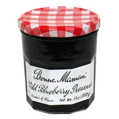 Bonne Maman preserves enjoyed on a bagel for a bright morning treat.