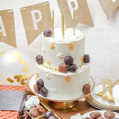 BONNIE AND POP Cashew clusters in chocolate, a shareable treat for gatherings.